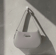 minimalist half moon shoulder bag with gold hardware