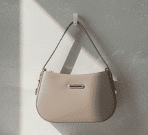 minimalist half moon shoulder bag with gold hardware